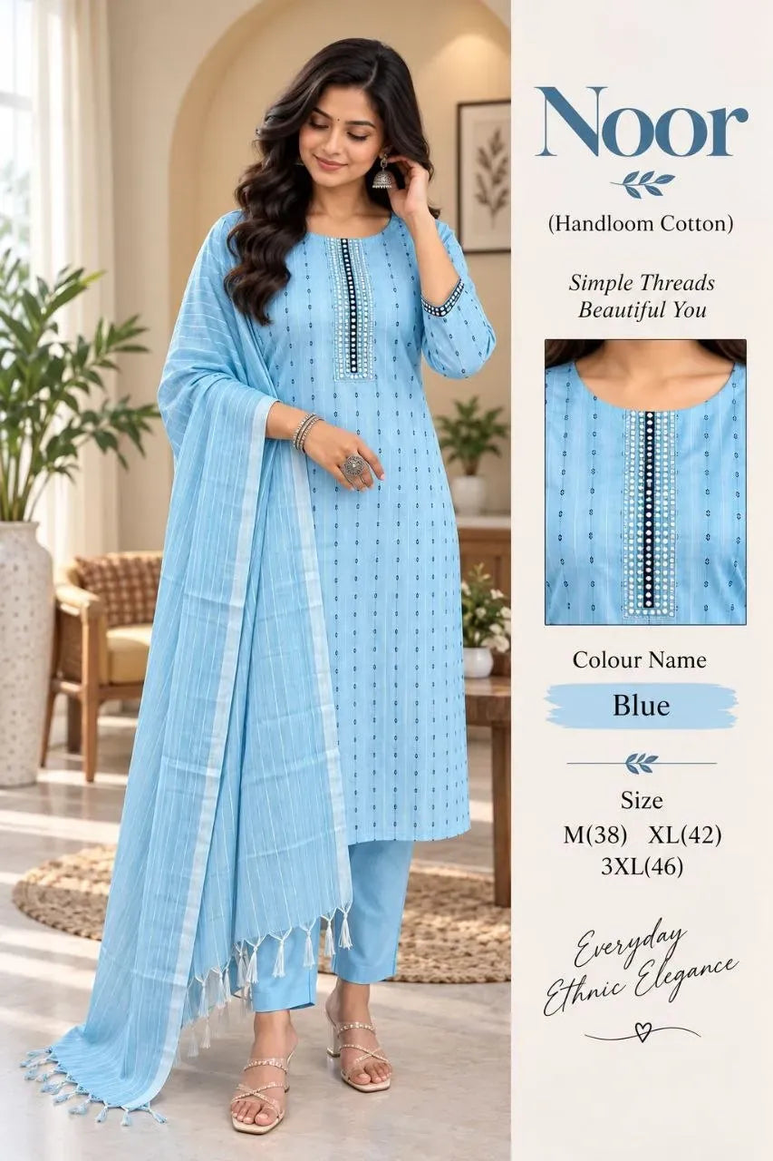 Model wearing light blue handloom cotton kurta set with mirror work and dupatta