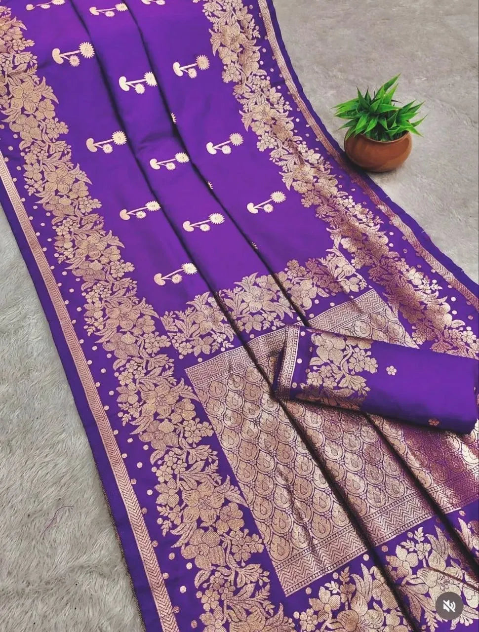 Purple jacquard silk saree with gold floral weaving and matching blouse piece