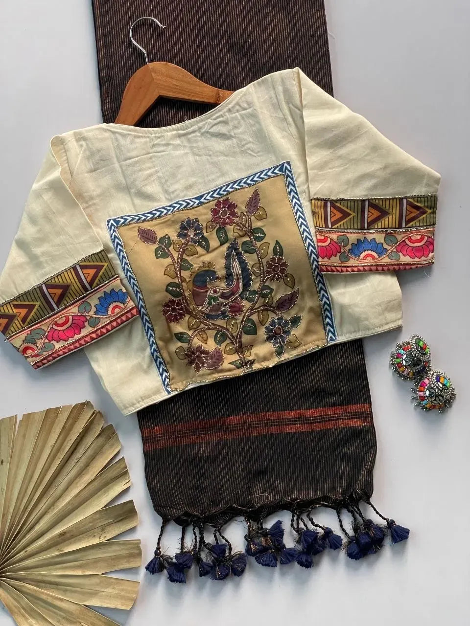 Khadi cotton saree with peacock art blouse and earrings