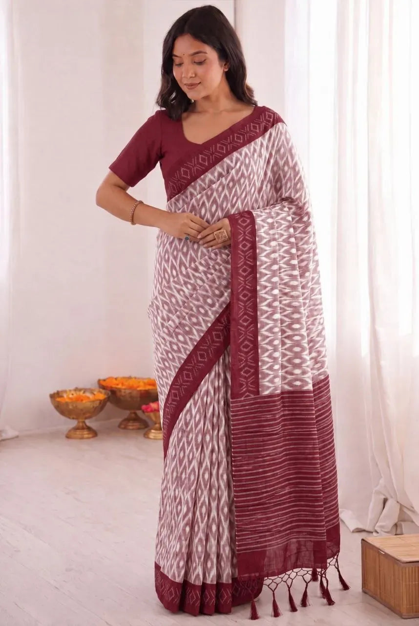 Model wearing maroon khadi digital print saree with matching blouse