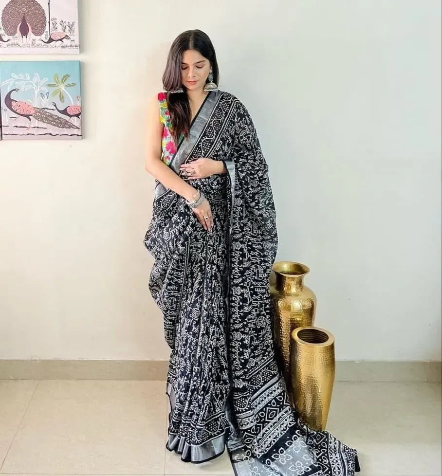 Black linen saree with white print and silver jari border on model