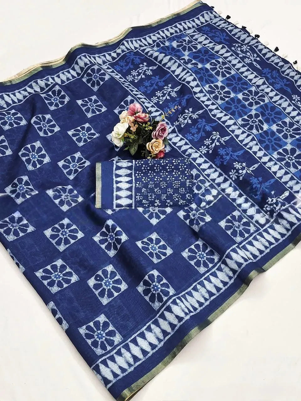 Blue malmal cotton denim print saree with floral motif and zari border