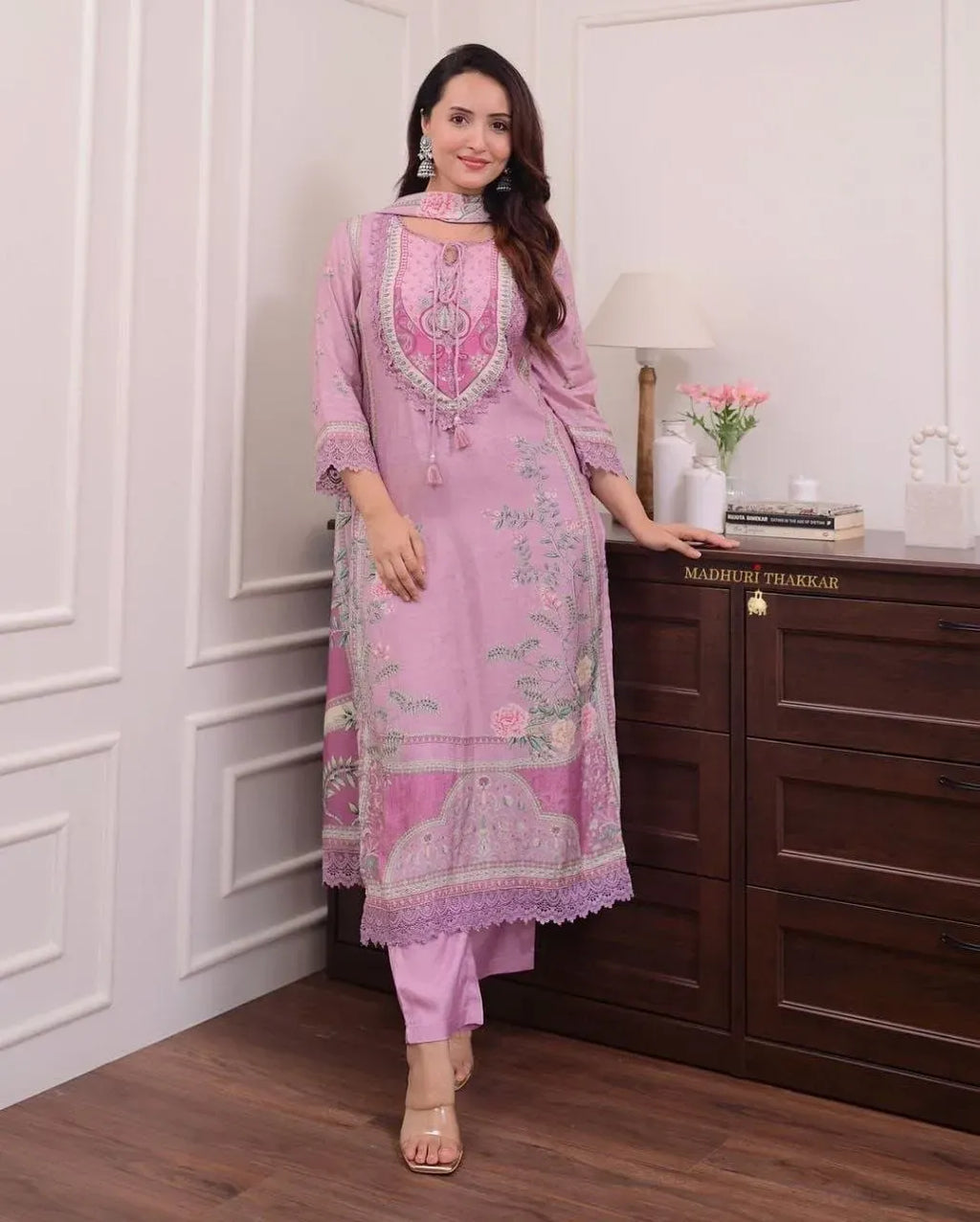 Model wearing lilac muslin Pakistani suit with floral digital prints and embroidery