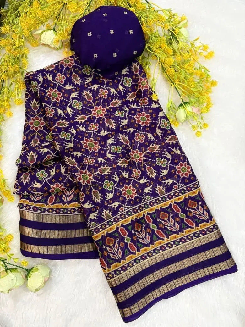 Purple soft georgette saree with intricate Patola print and gold border