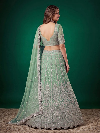 Exclusive Pista Green Net Lehenga Choli with Heavy Zari Embroidery - Festive Wear for Women
