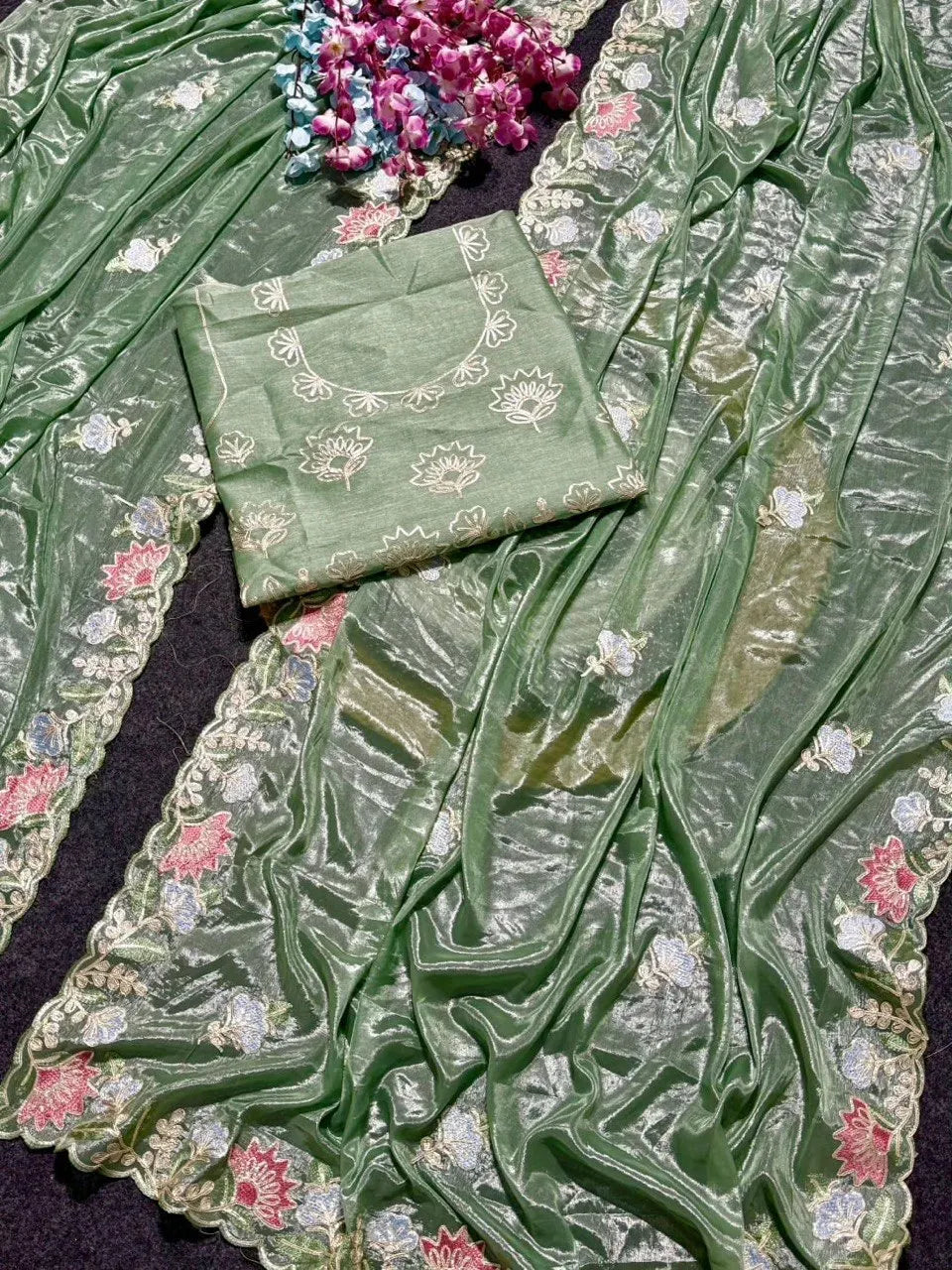 Sage green prada silk saree with floral thread work and matching blouse piece