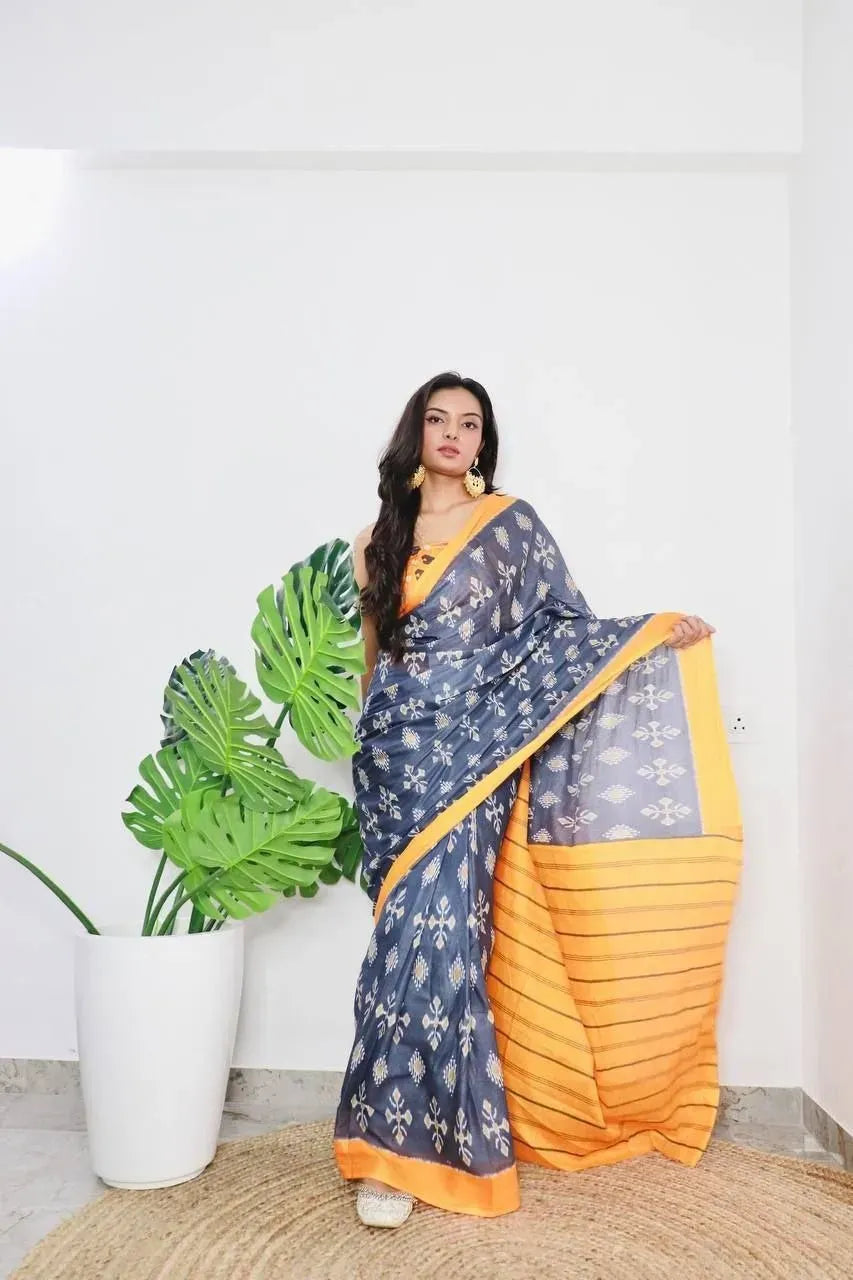 Model wearing grey and yellow jaipur block print pure cotton saree