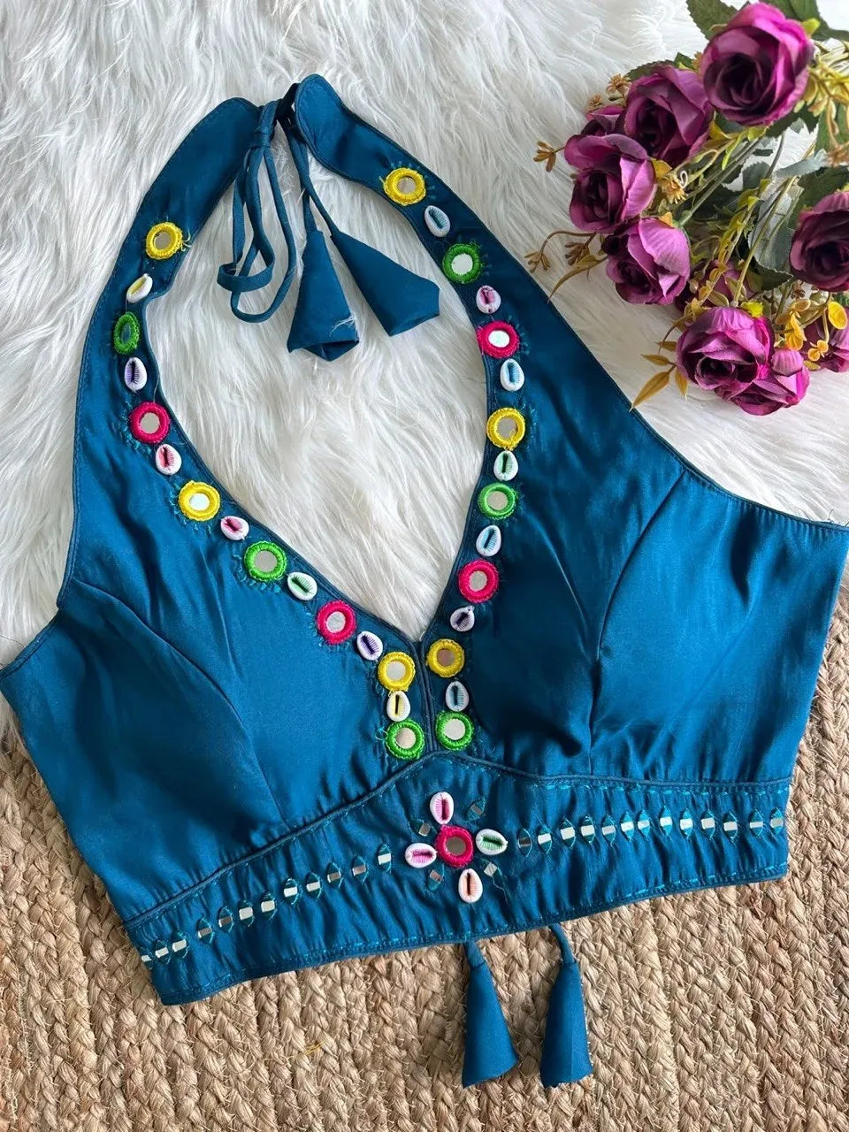 Teal blue Roman silk halter neck blouse with colorful thread, real mirror, and kaudi shell work