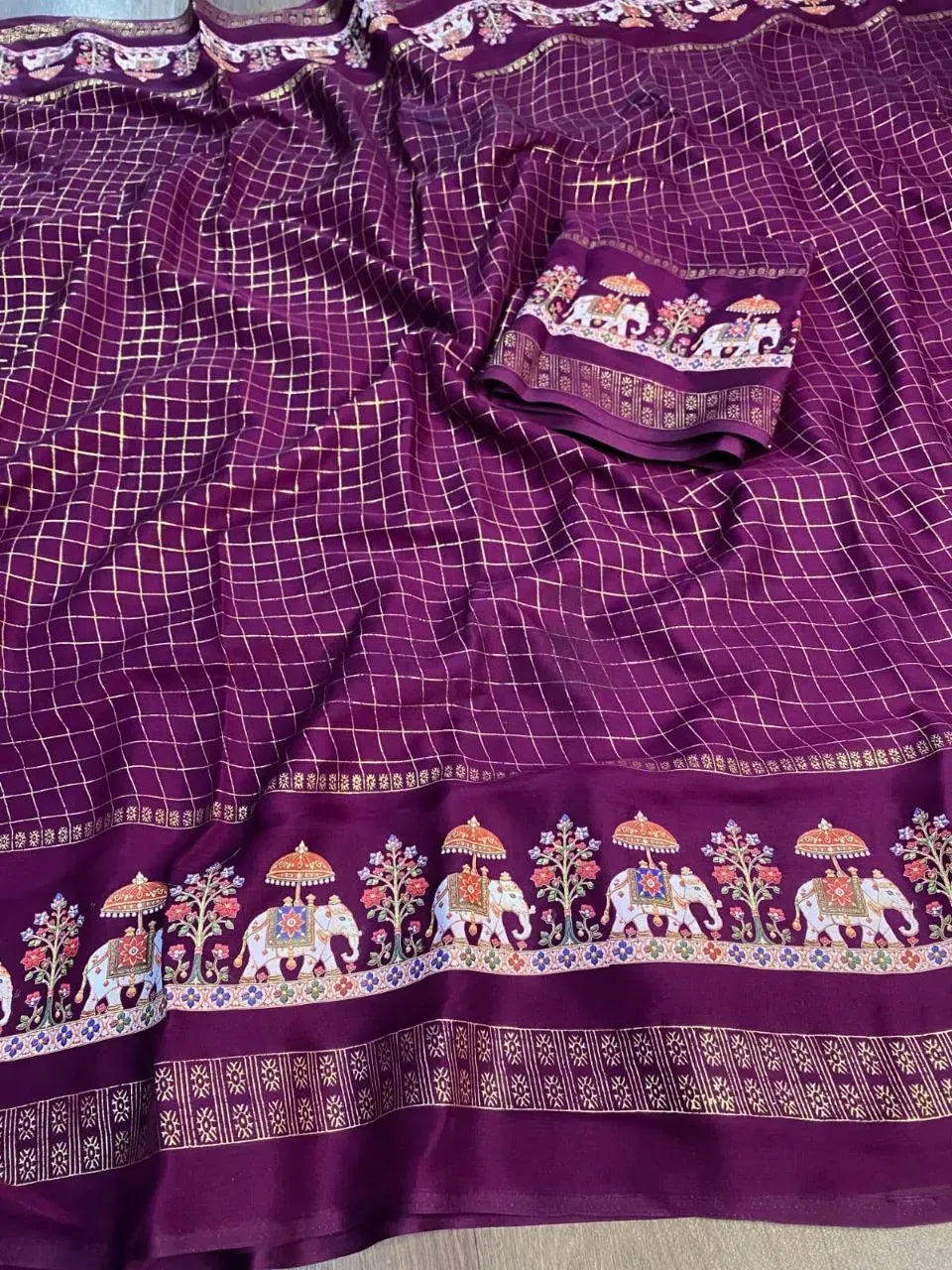 Purple satin chiffon saree with gold foil chex and elephant print border