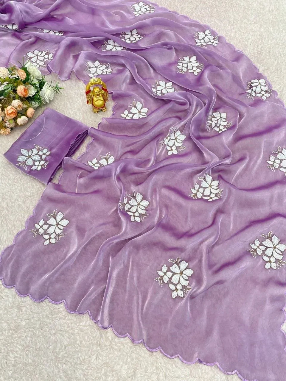 Lavender satin silk saree with white floral embroidery and cut work border