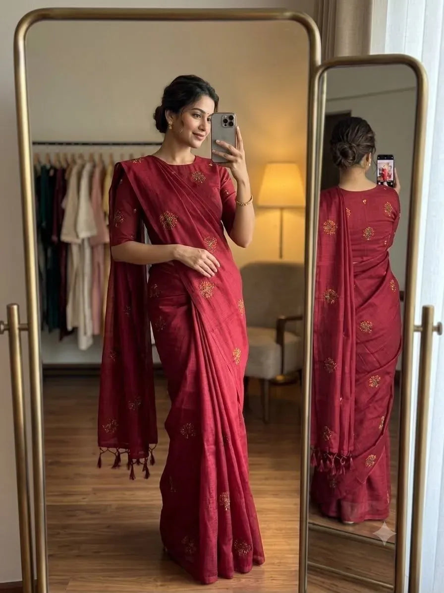 Woman wearing maroon soft kota silk saree with embroidery work