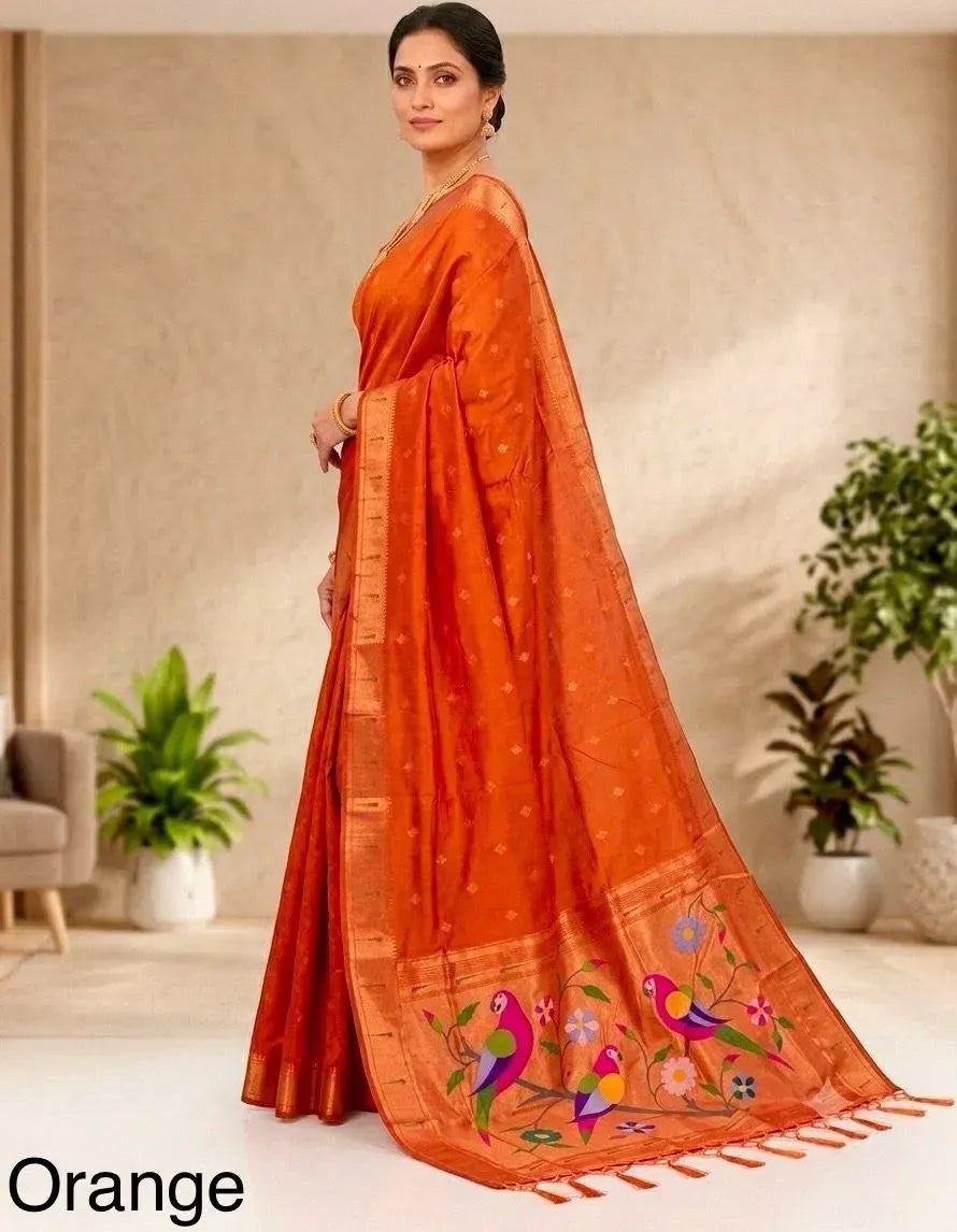 Orange pure silk saree with traditional weaving on model