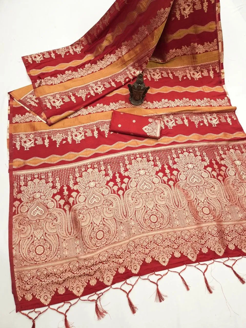 Red banarasi khadi georgette silk saree with intricate zari pallu and matching blouse piece