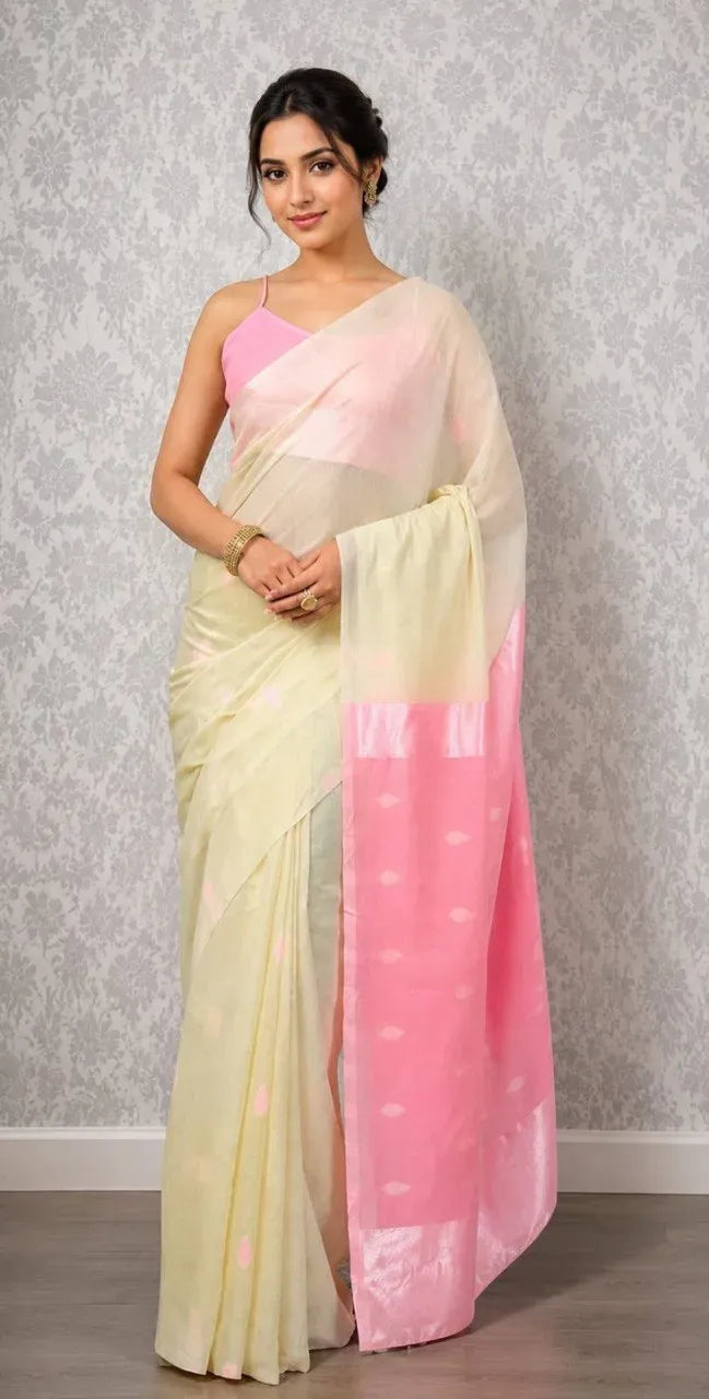 Model wearing pastel cream and pink soft lichi silk banarasi saree