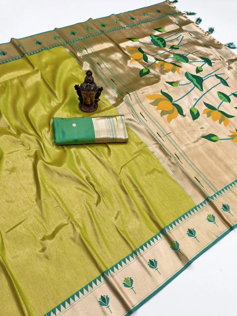 Light green pure banarasi silk saree with gold zari pallu and lotus motifs