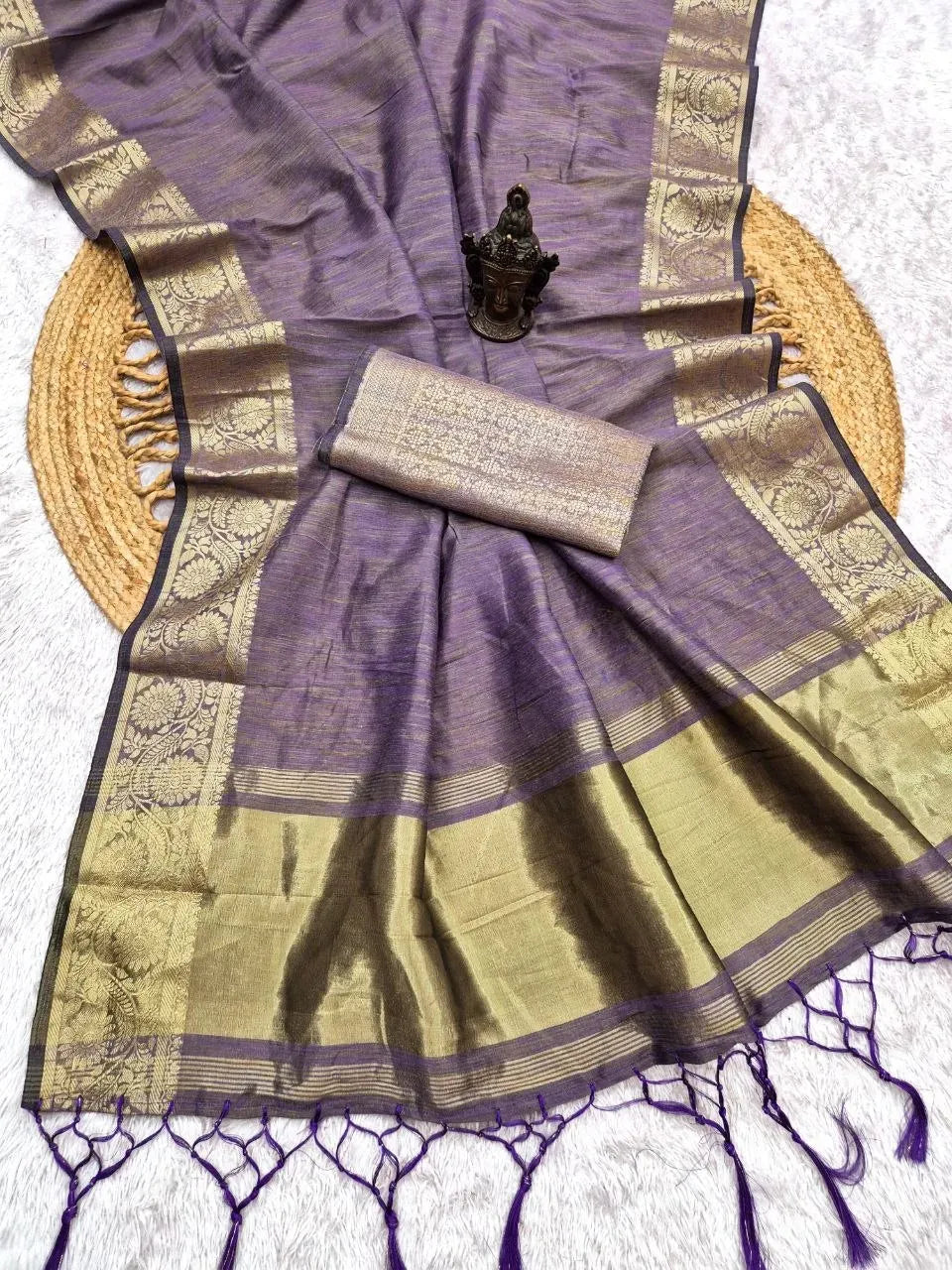 Purple banarasi silk saree with gold zari border and matching blouse piece
