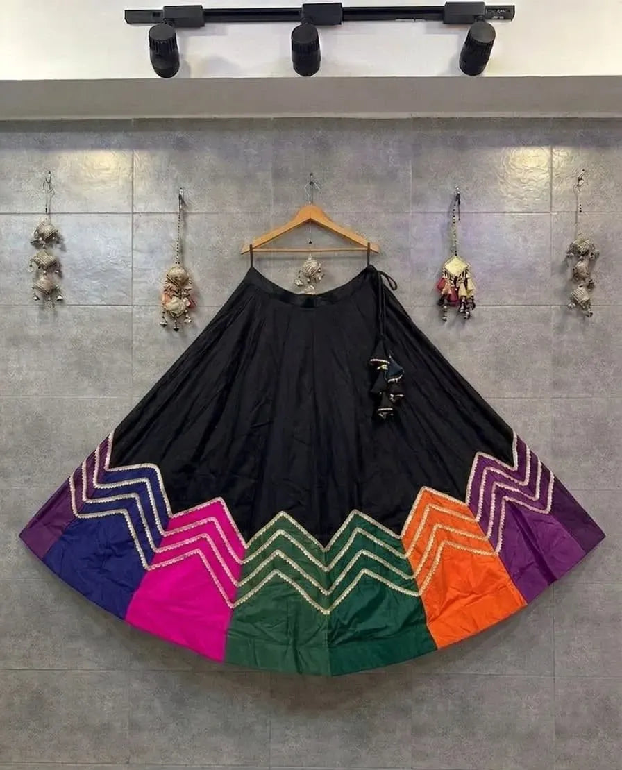 Black pure roman cotton silk chaniya with multi-colored panel border on wooden hanger