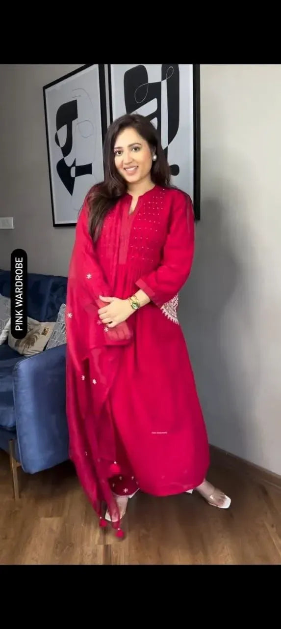 Full length view of woman wearing red cotton suit set with dupatta