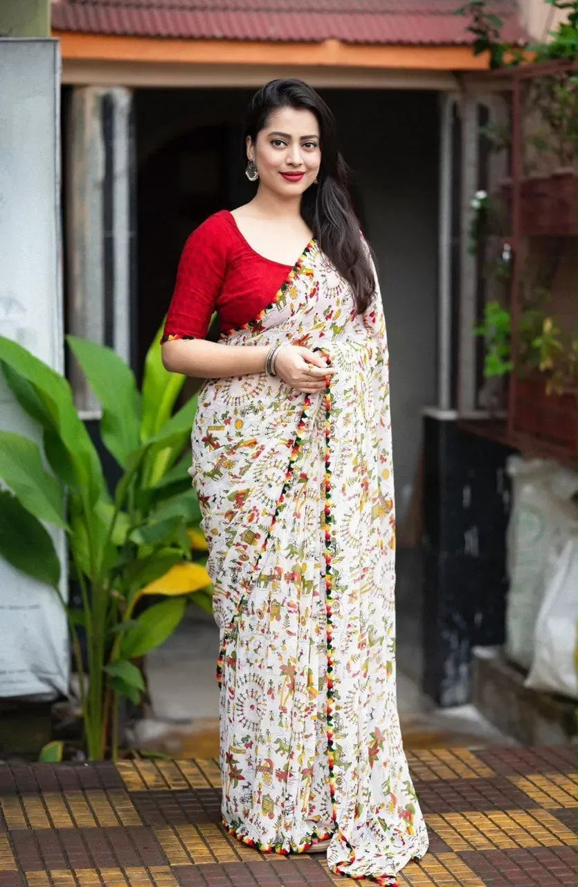 Model wearing white and multi-color Warli print georgette saree with red blouse front view