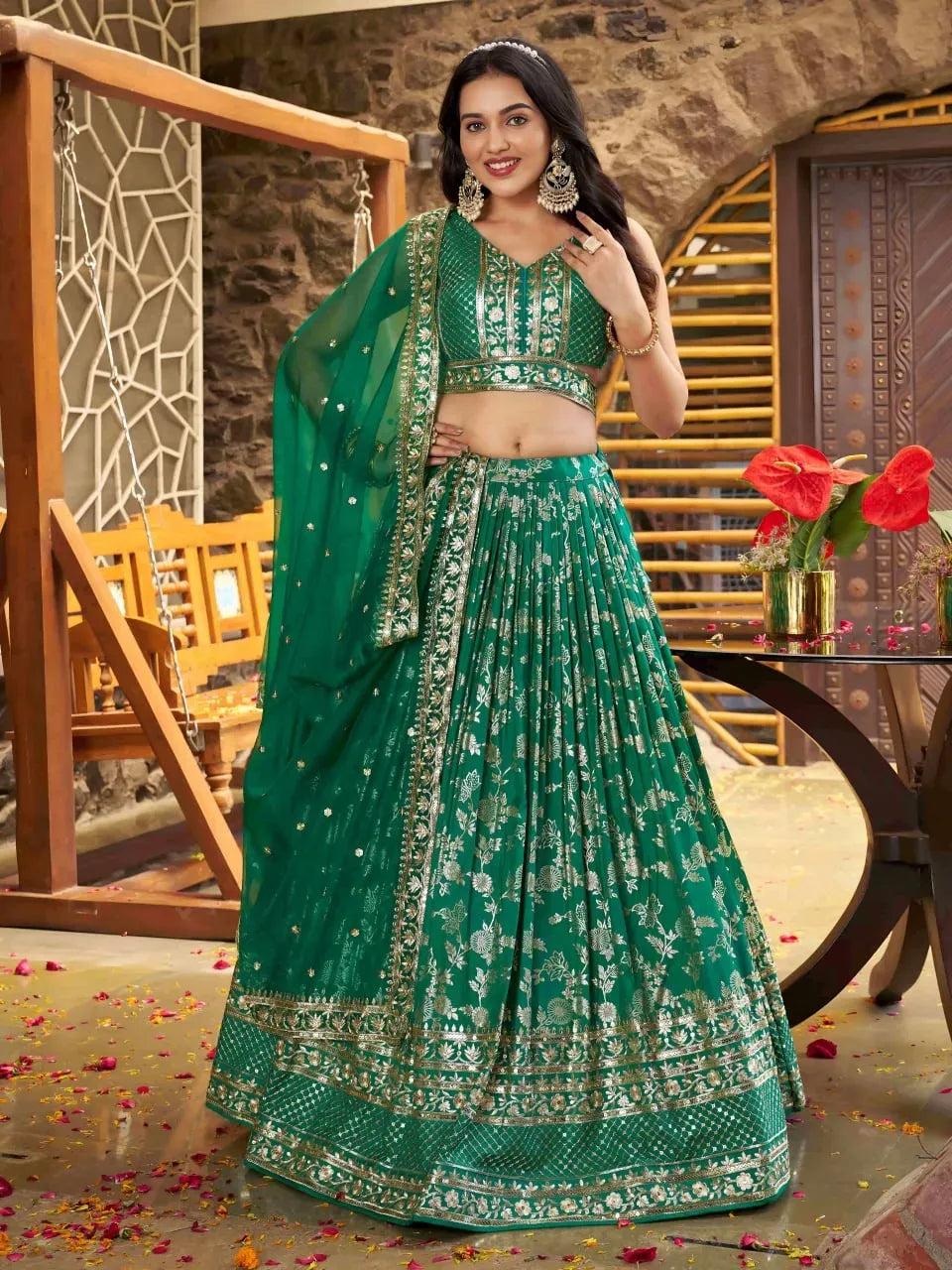 Model wearing rama green jacquard silk lehenga with heavy zari and sequin embroidery
