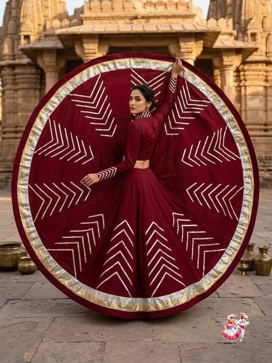 Model wearing maroon pure rayon cotton lehenga with heavy lampi border