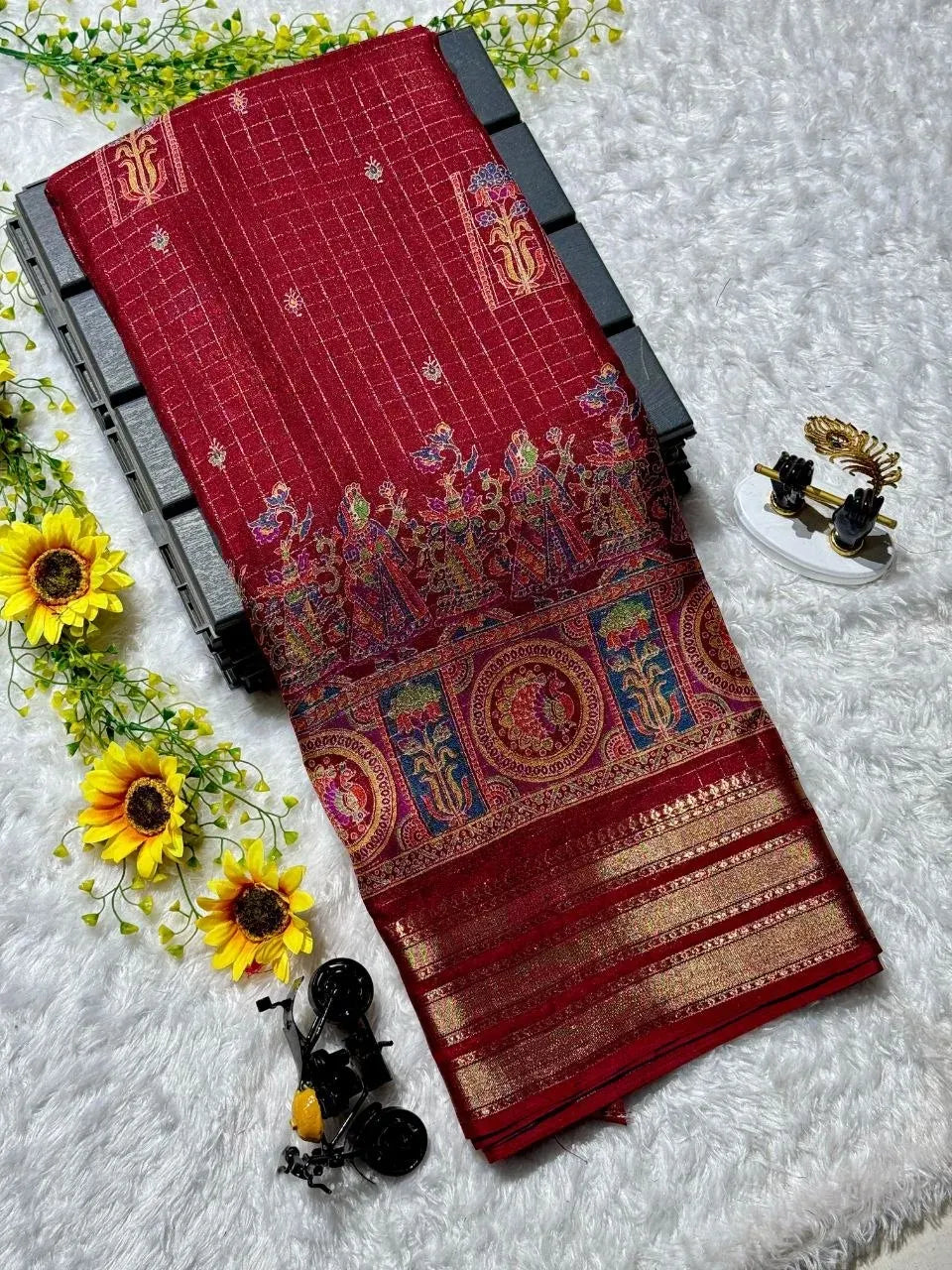 Red georgette saree with intricate gold Ajrakh print and decorative yellow flowers