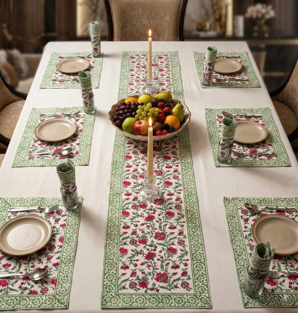 Green and pink hand block print table mat set with matching runner on dining table