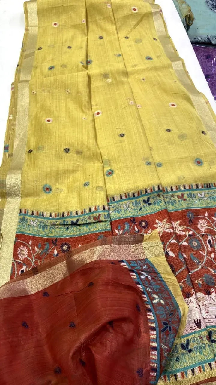 Yellow Jamdani saree with red pallu and intricate butta work laid flat