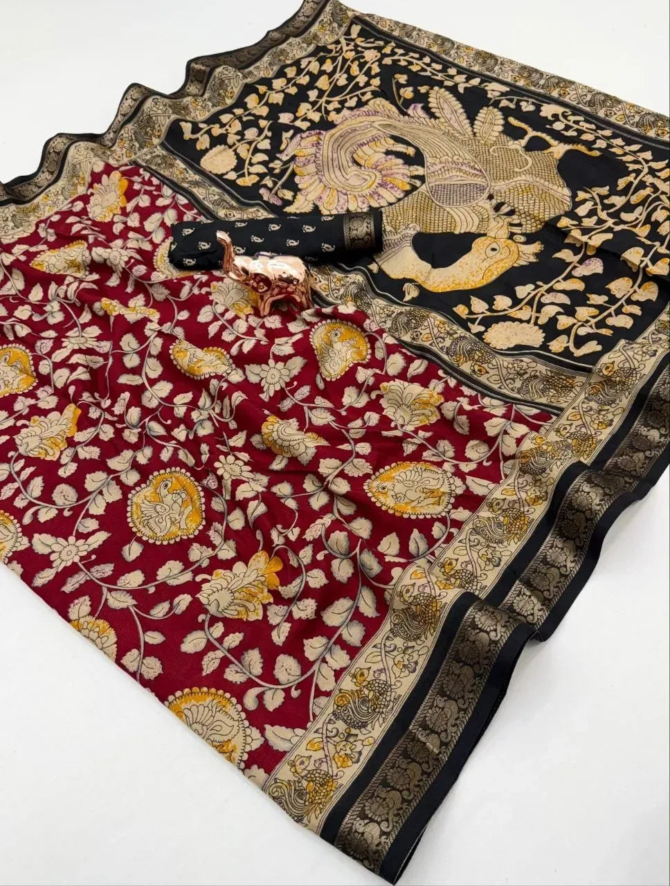 Red and black kalamkari cotton saree with zari peacock border and blouse piece