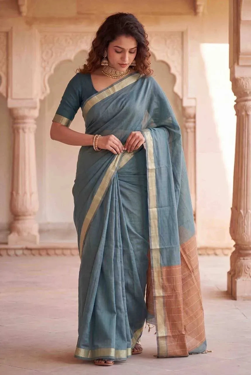 Full body view of model in traditional grey cotton saree