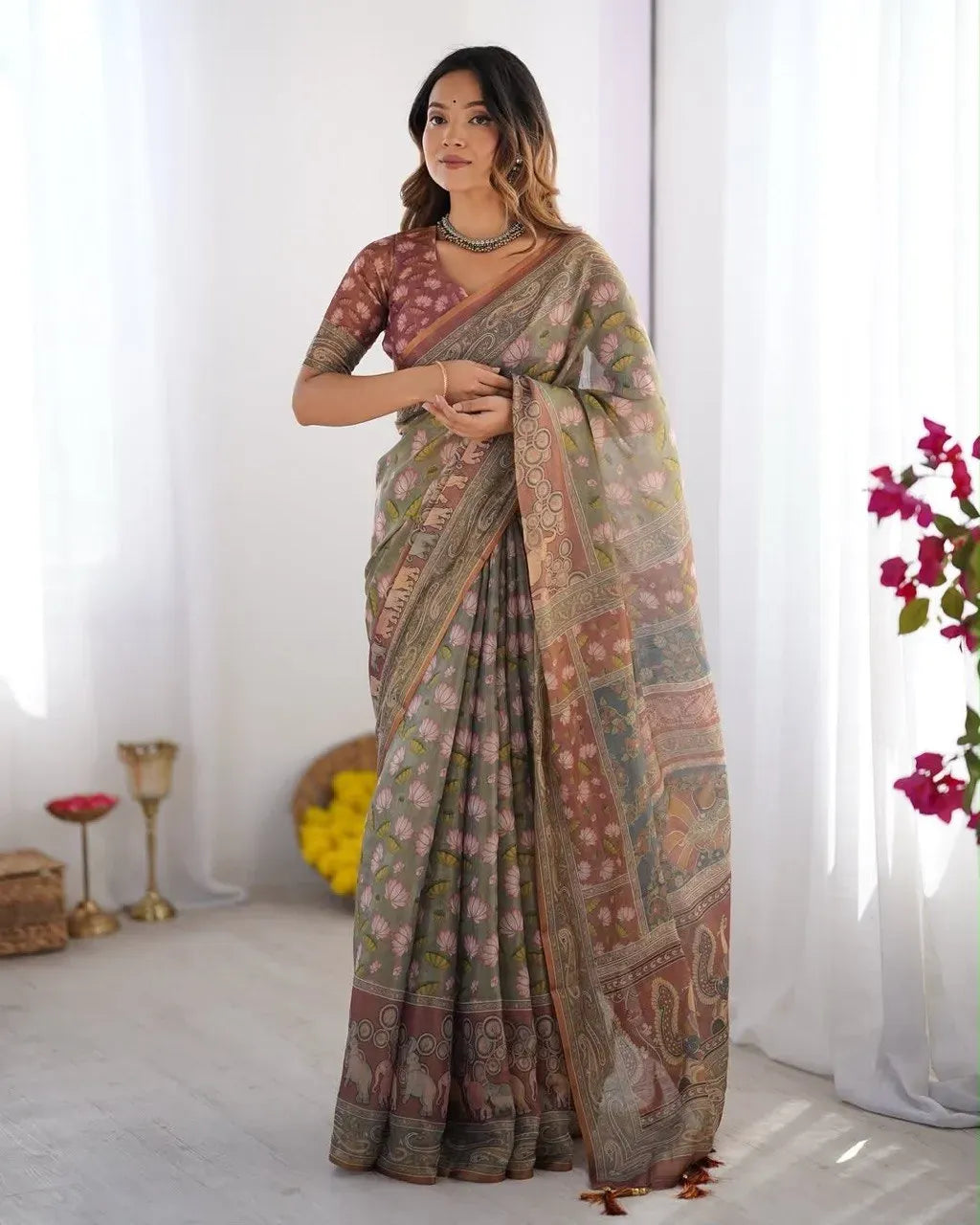 Full body view of model standing in floral printed linen cotton saree
