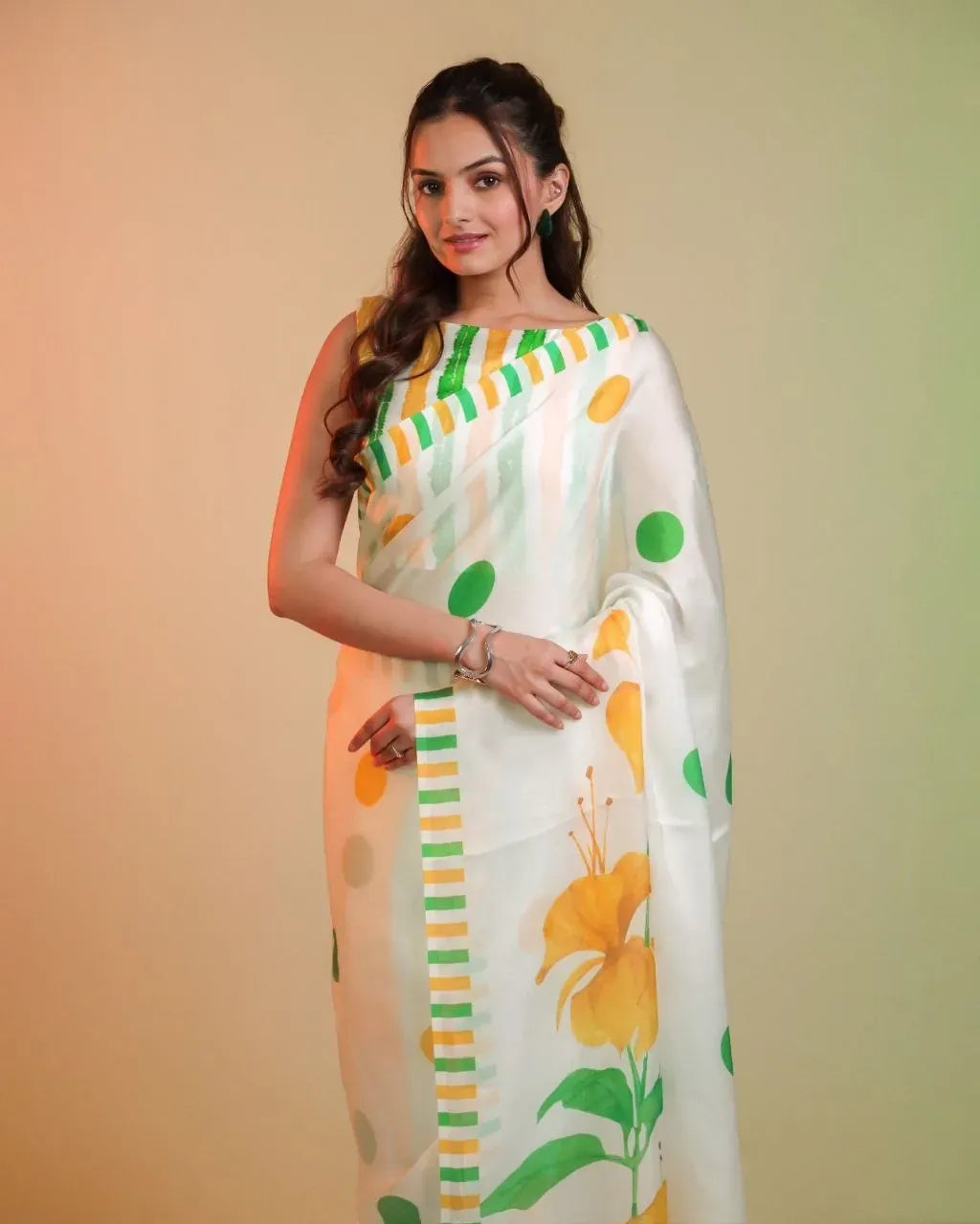 Model wearing white saree with yellow and green floral digital prints