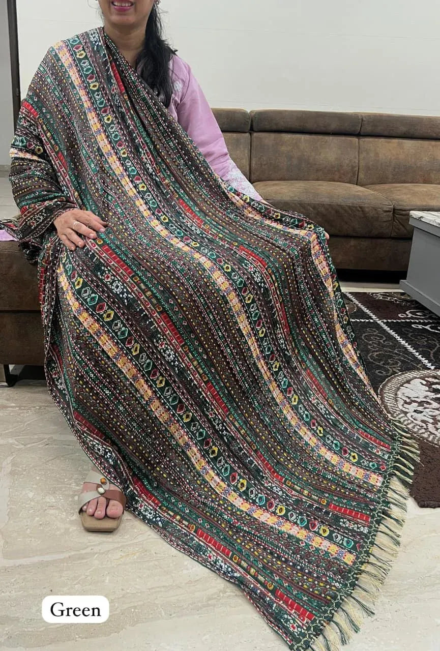 Woman wearing green printed chinon crush dupatta with border jhalar