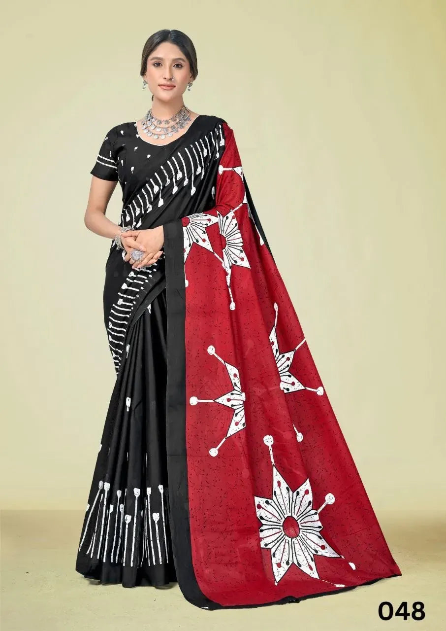 Model wearing black pure cotton saree with striking red pallu and white floral print