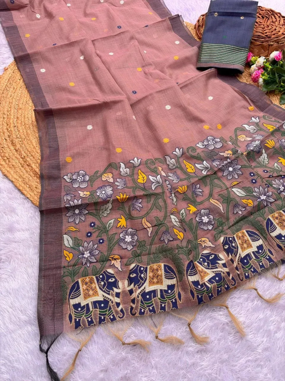 Dusty pink pure jamdani silk saree with floral and elephant border design