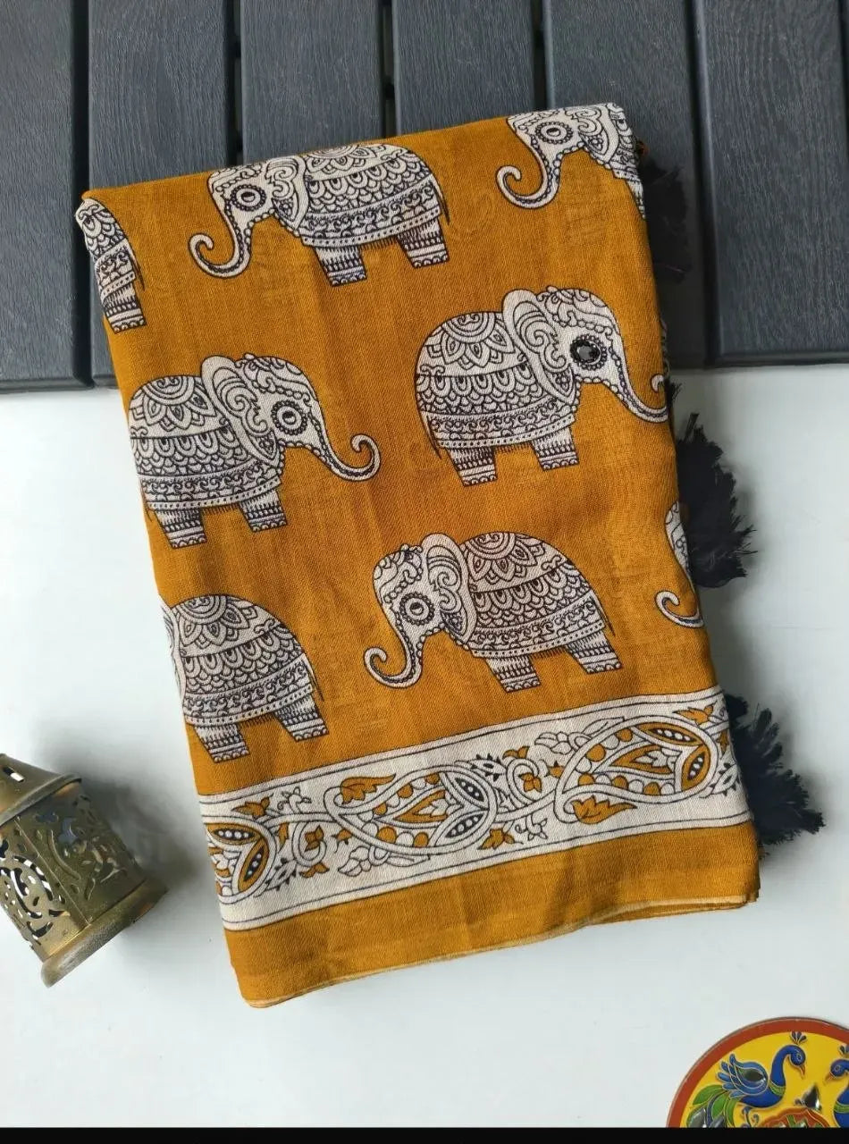 Close-up of yellow pure linen saree featuring intricate elephant prints and border