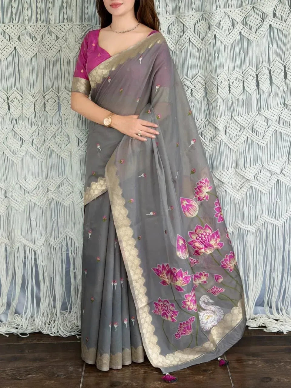 Full body view of model in grey modal cotton saree with intricate zari border