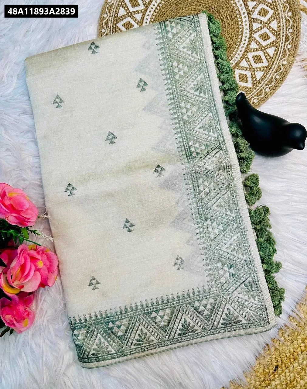 Flat lay of Pure Tussar Saree with Green Multi-Thread Embroidery and Tassels by TRENDBUY