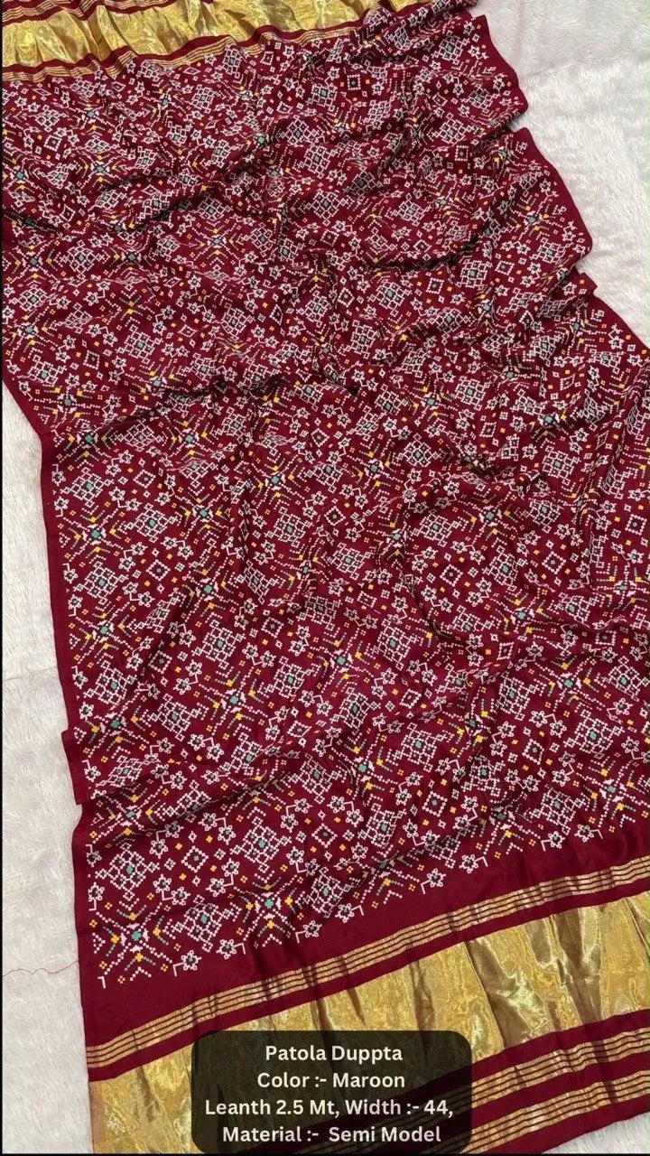 Maroon semi gaji silk dupatta with traditional print and gold zari pallu