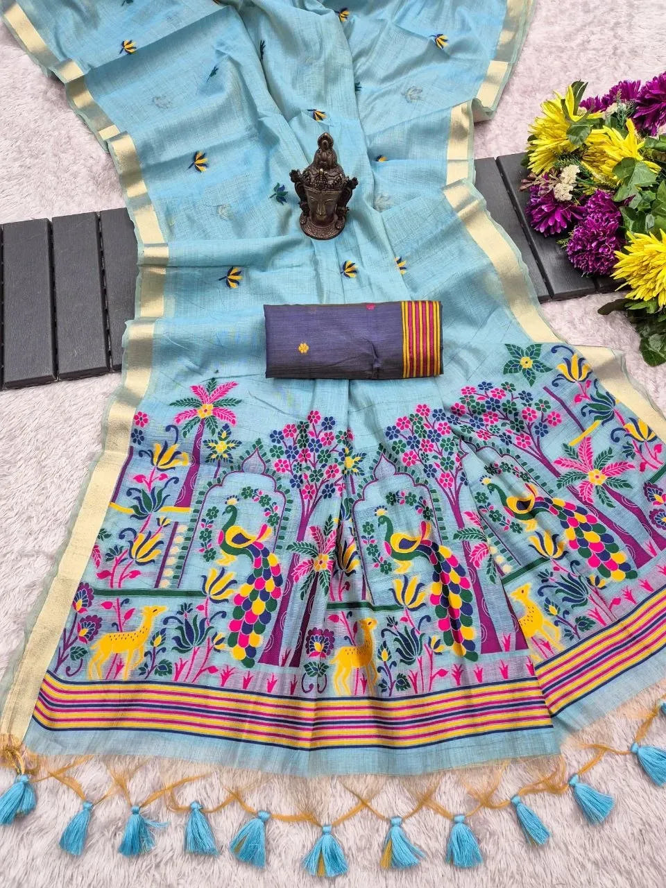 Light blue soft mul cotton saree with zari weaving and contrast blouse piece