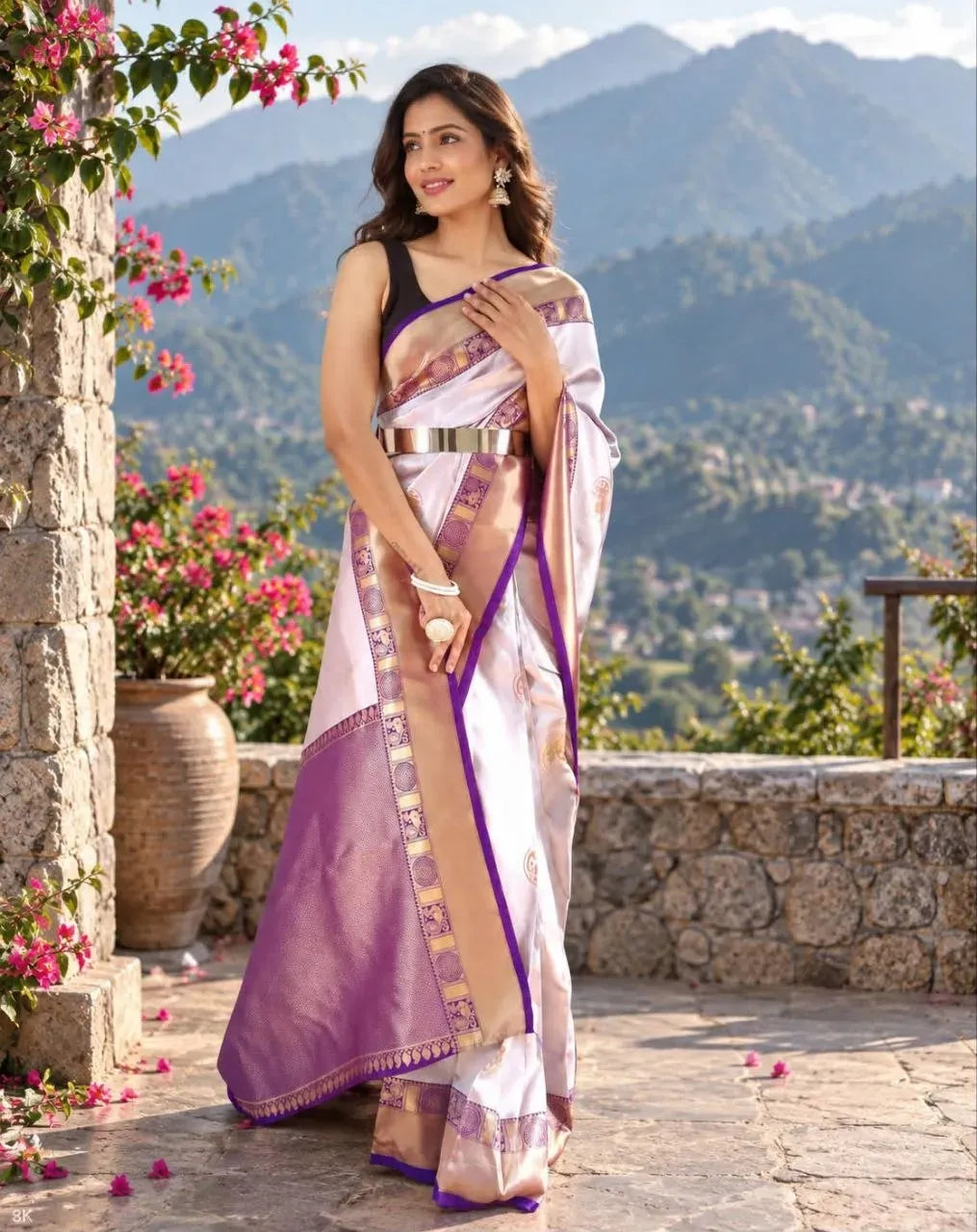 Model wearing soft silk saree with purple jacquard border outdoors
