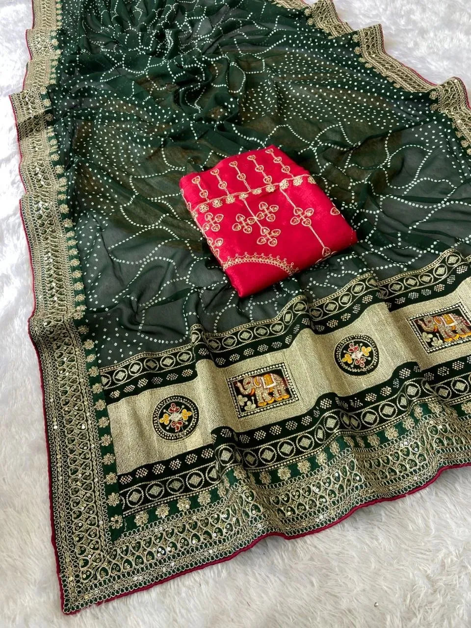 Dark green vichitra silk saree with bandej pattern and folded red embroidered blouse