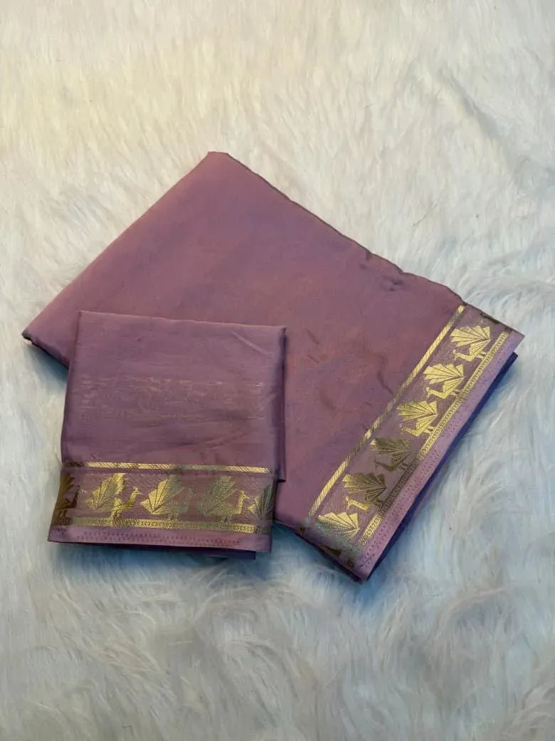 Lavender viscose georgette saree folded with matching blouse piece