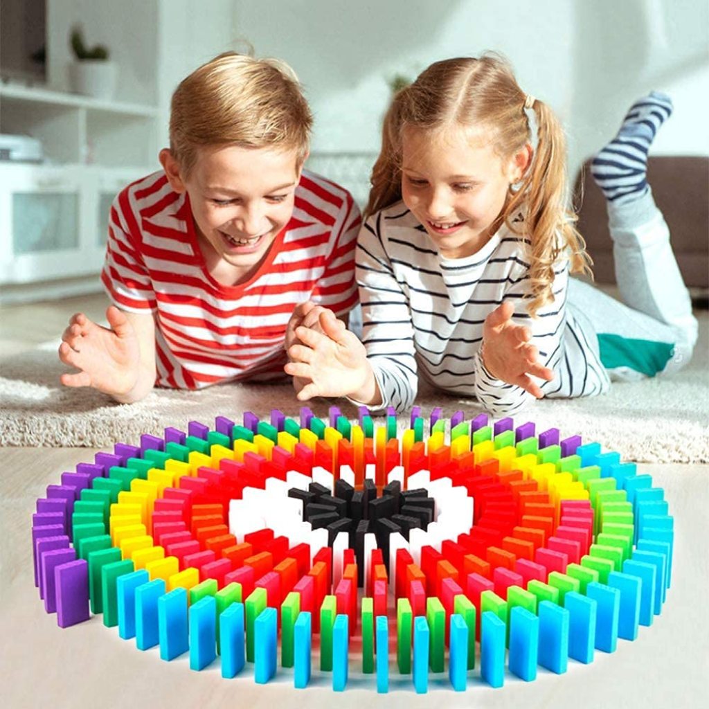 120 natural wooden dominoes, neatly arranged, highlighting their smooth finish for the game.