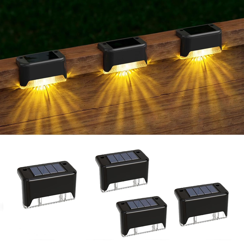 4 pc solar step lights illuminating wooden deck steps