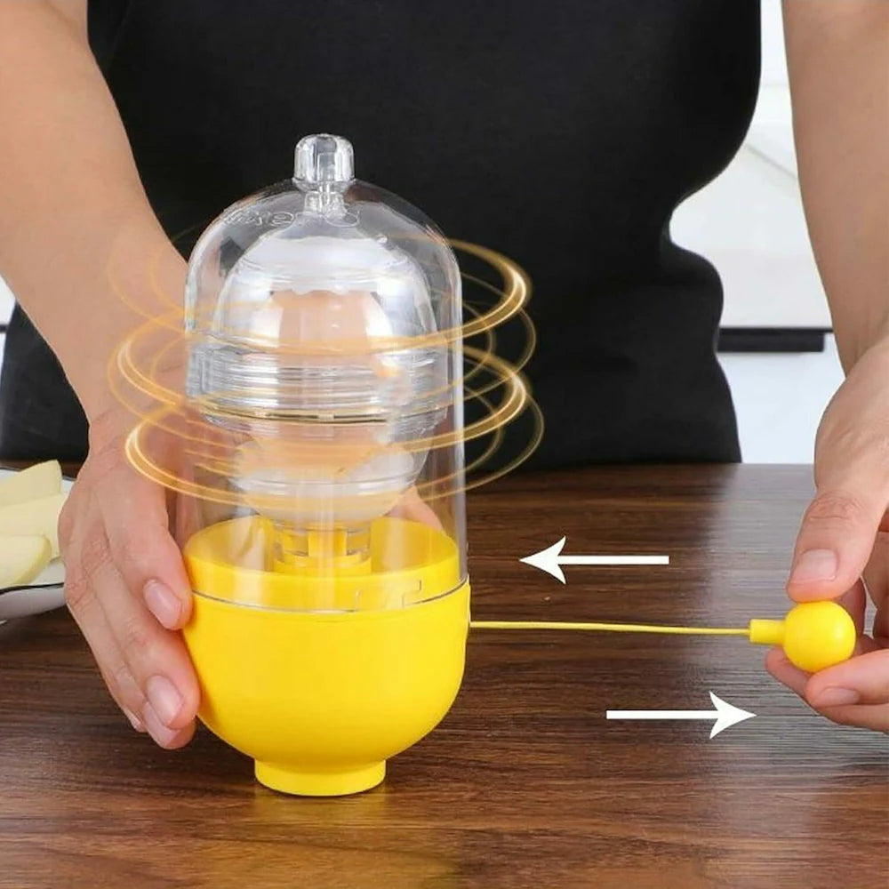 Yellow kitchen tool with a clear dome on a wooden surface