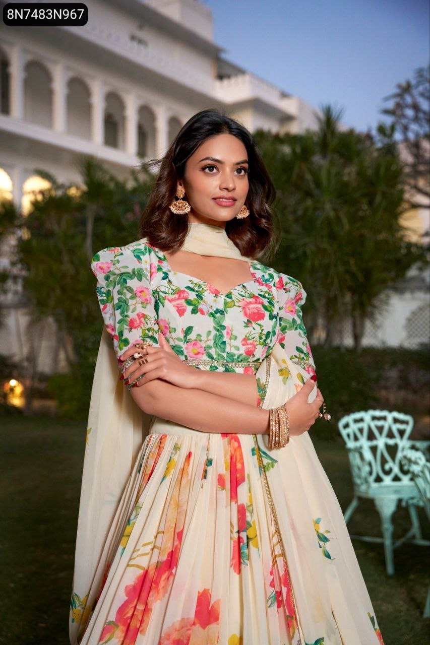 Woman in floral print georgette lehenga choli, front view, in a garden.