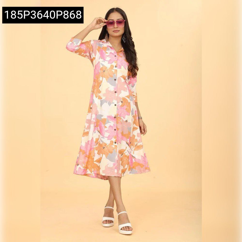 Woman in floral pink and orange rayon midi dress with sunglasses, posing front