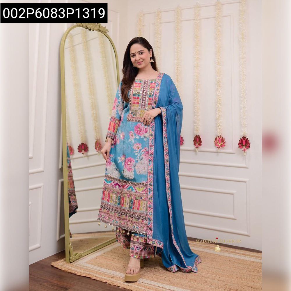Full body front pose of a woman elegantly showcasing the Teal Blue Floral Printed and Embroidered Palazzo Suit for a festive occasion.