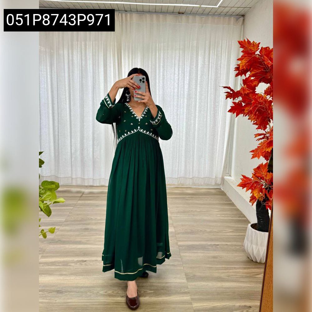 Full body model wearing an Emerald Green Fox Georgette Anarkali Gown with embroidered yoke.